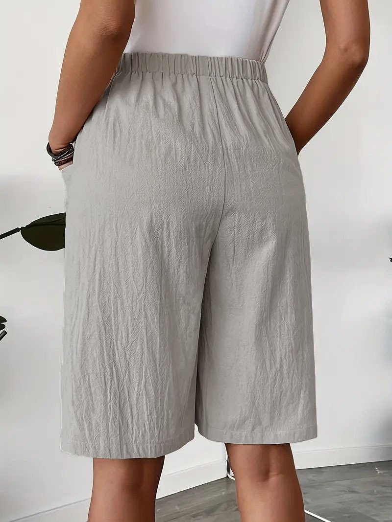 Pantalón corto efecto falda — Corte recto con cintura elástica y bolsillos - Imagen 3