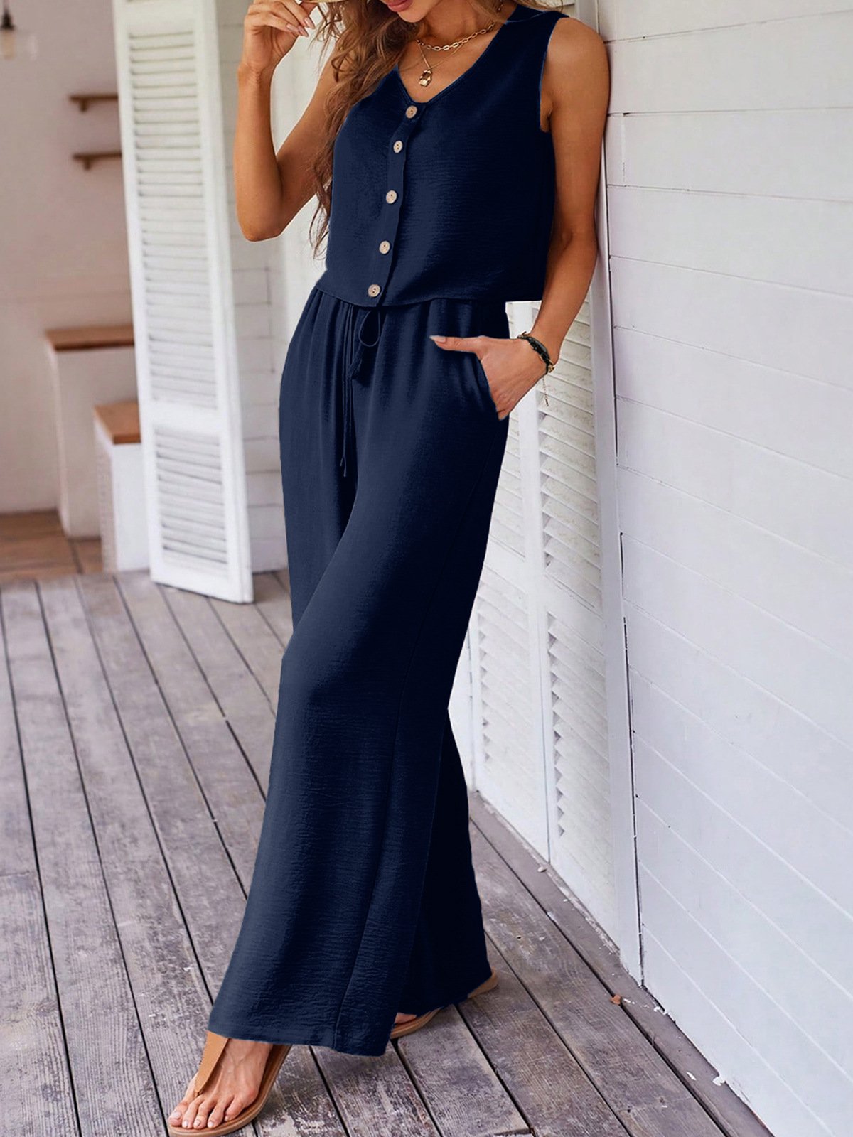 Conjunto de dos piezas: top sin mangas abotonado + pantalón ancho con bolsillos – estilo elegante y cómodo